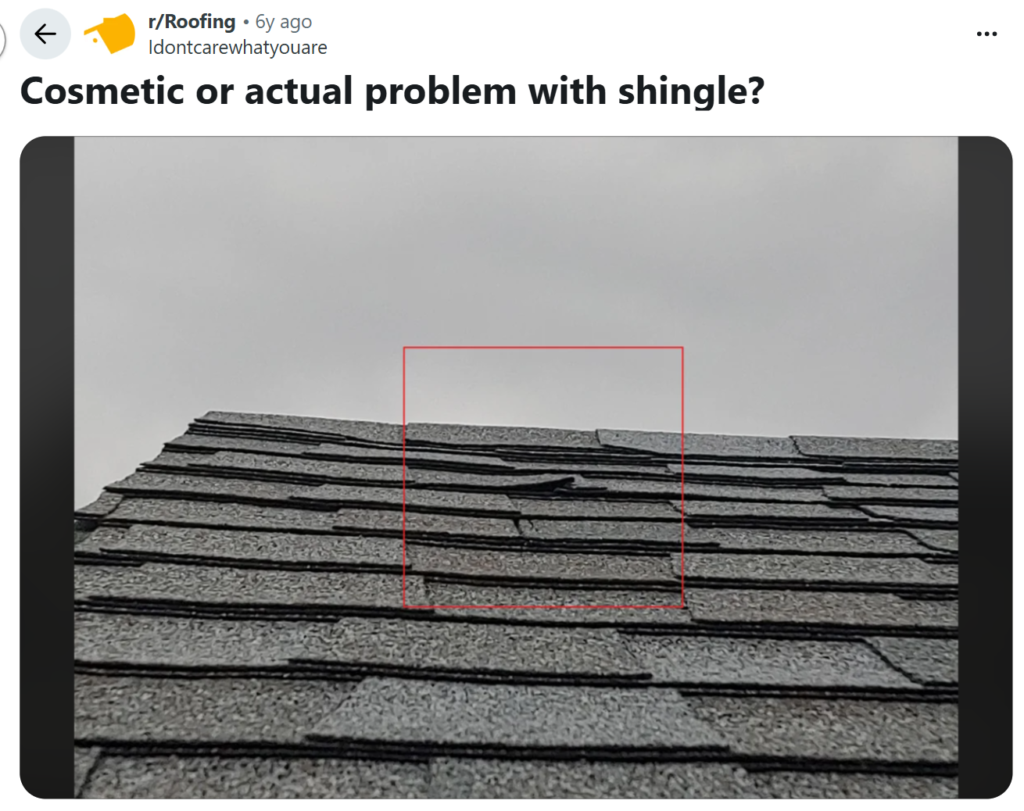 Reddit post showing a gray roof with a lifted shingle highlighted by a red box.